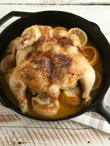 cast iron whole chicken with lemons and white wine