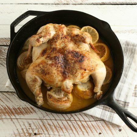 cast iron whole chicken with lemons and white wine