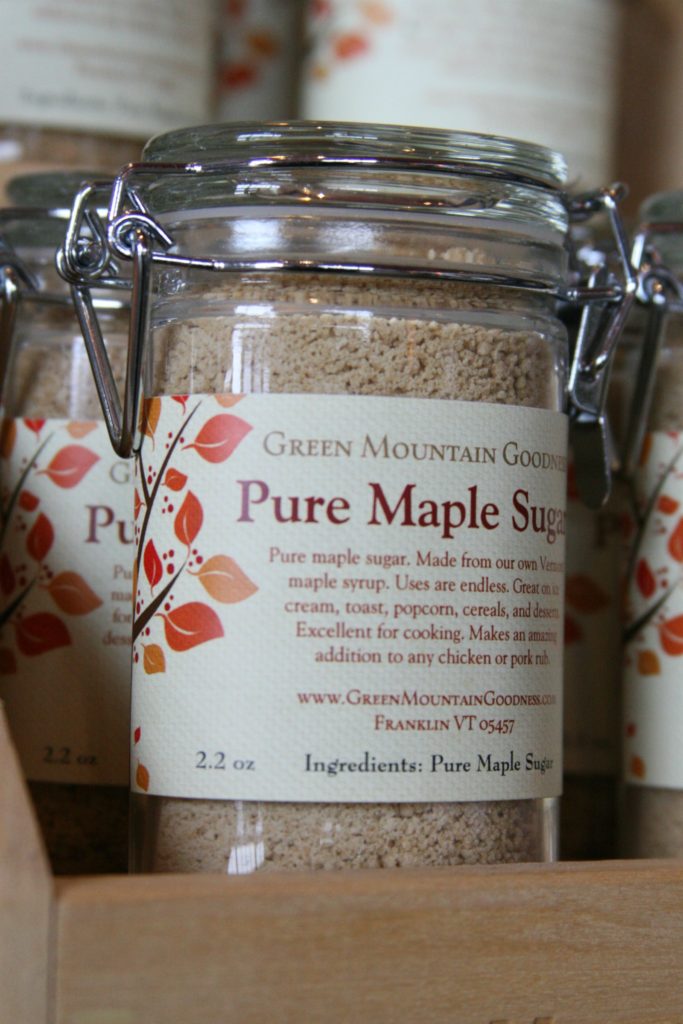 granulated maple sugar in small glass jars