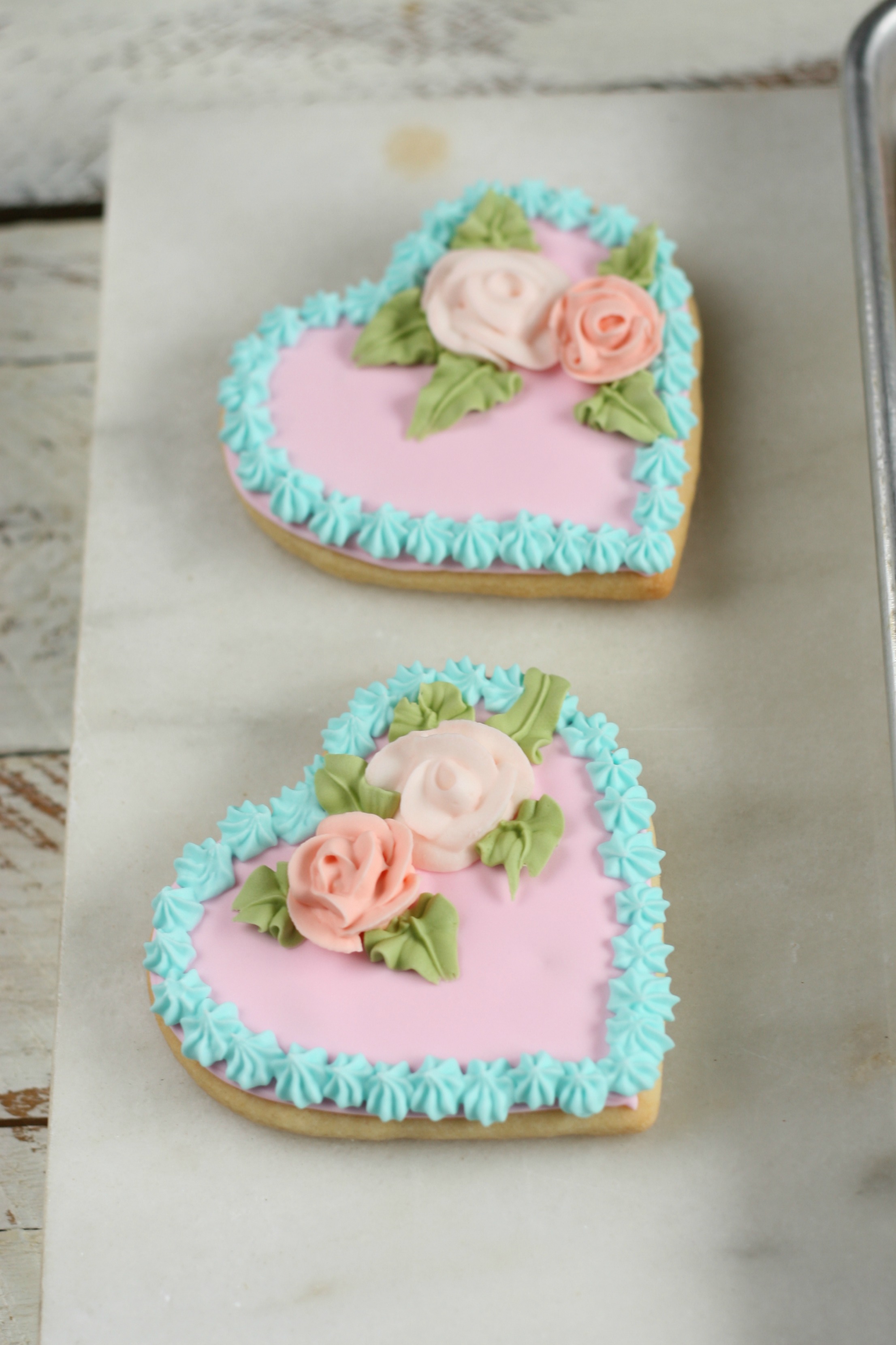 https://afarmgirlskitchen.com/wp-content/uploads/2018/01/Decorated-heart-shaped-sugar-cookies.jpg