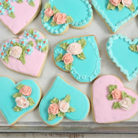 Heart shaped sugar cookies with handmade sugar roses