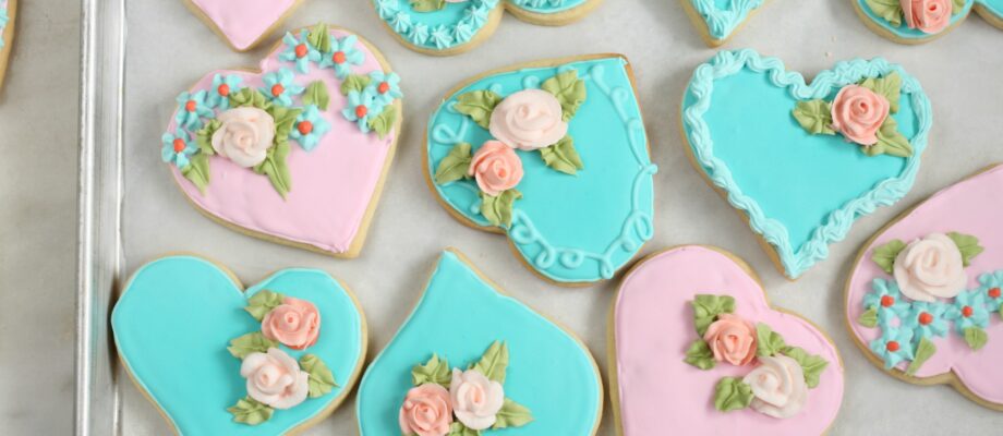 Heart shaped sugar cookies with handmade sugar roses