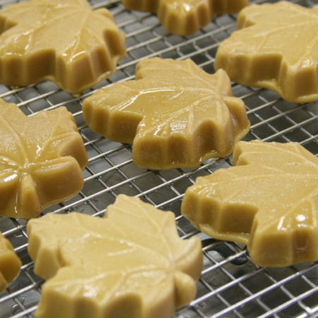 Pure maple candies drying on a baking rack