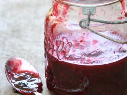Mixed berry jam in vintage Mason jar