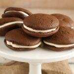 Chocolate Whoopie pies with peanut butter frosting