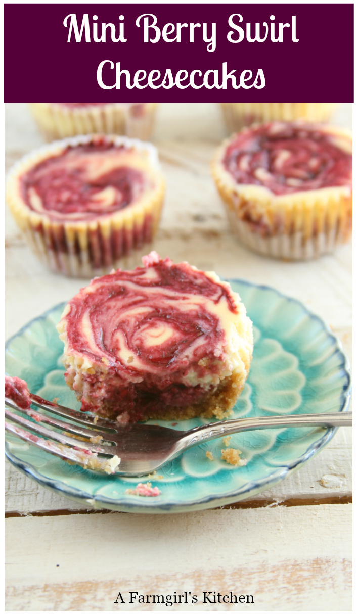 These Mini Berry Swirl Cheesecakes are super easy to make in a muffin tin, using everyday ingredients. They make perfect petite desserts. #dessert #cheesecake #berryswirlcheesecake #berries #recipes #easyrecipes