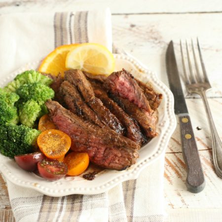 Citrus garlic marinated flank steak with broccoli and heirloom tomatoes
