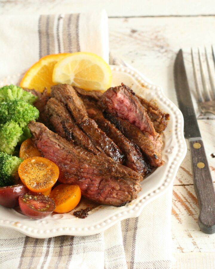 Citrus garlic marinated flank steak with broccoli and heirloom tomatoes