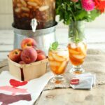 Fresh brewed peach sweet tea in glasses with fresh mint