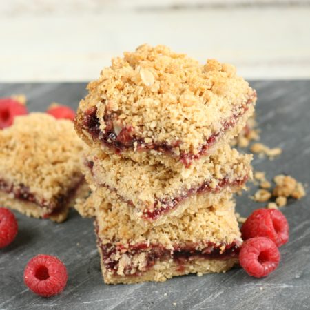 Make these yummy Raspberry Oatmeal Crumble Bars with only a few simple ingredients and a jar of Smucker's Jam. #raspberries #raspberry #recipe