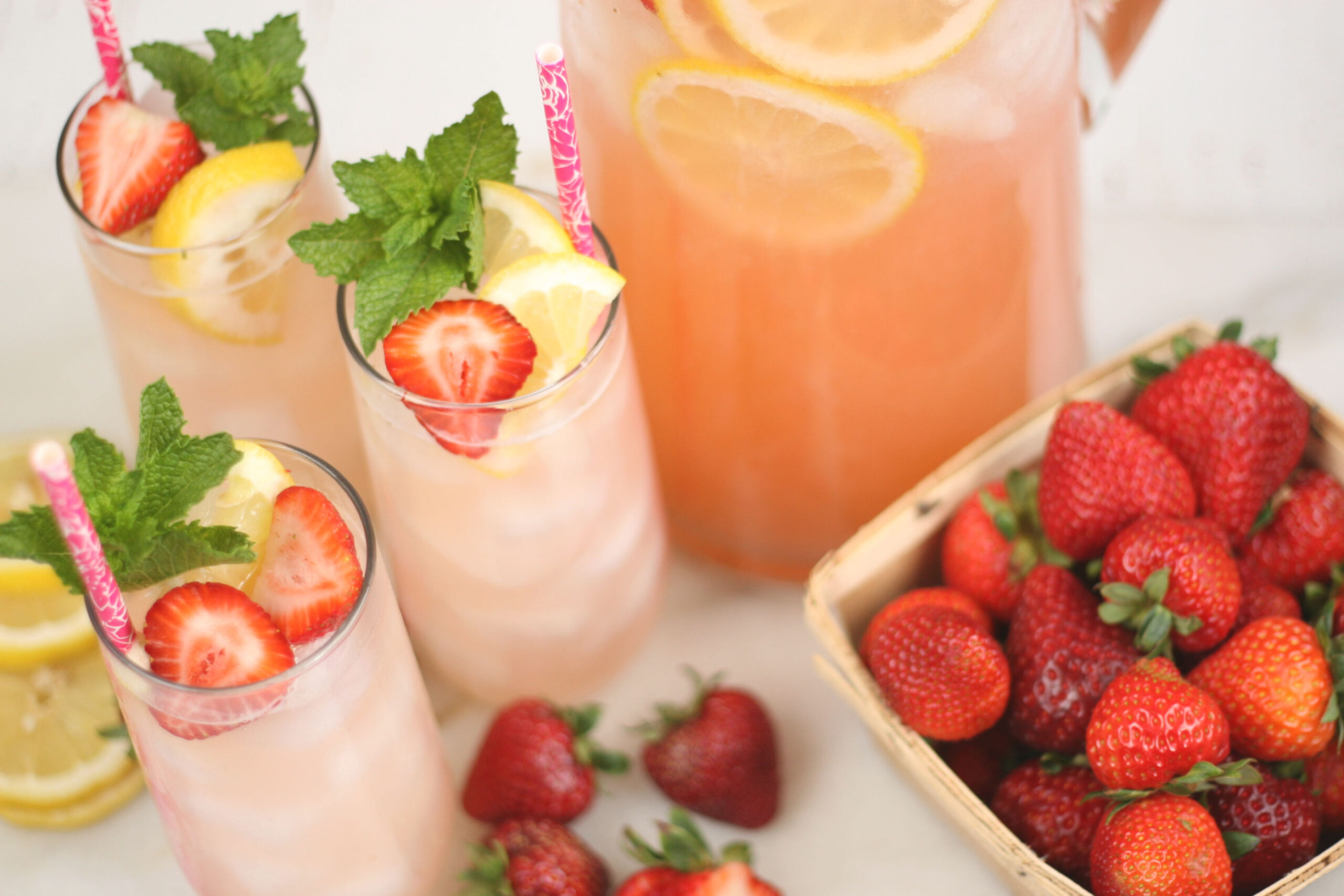 glasses of homemade strawberry lemonade.