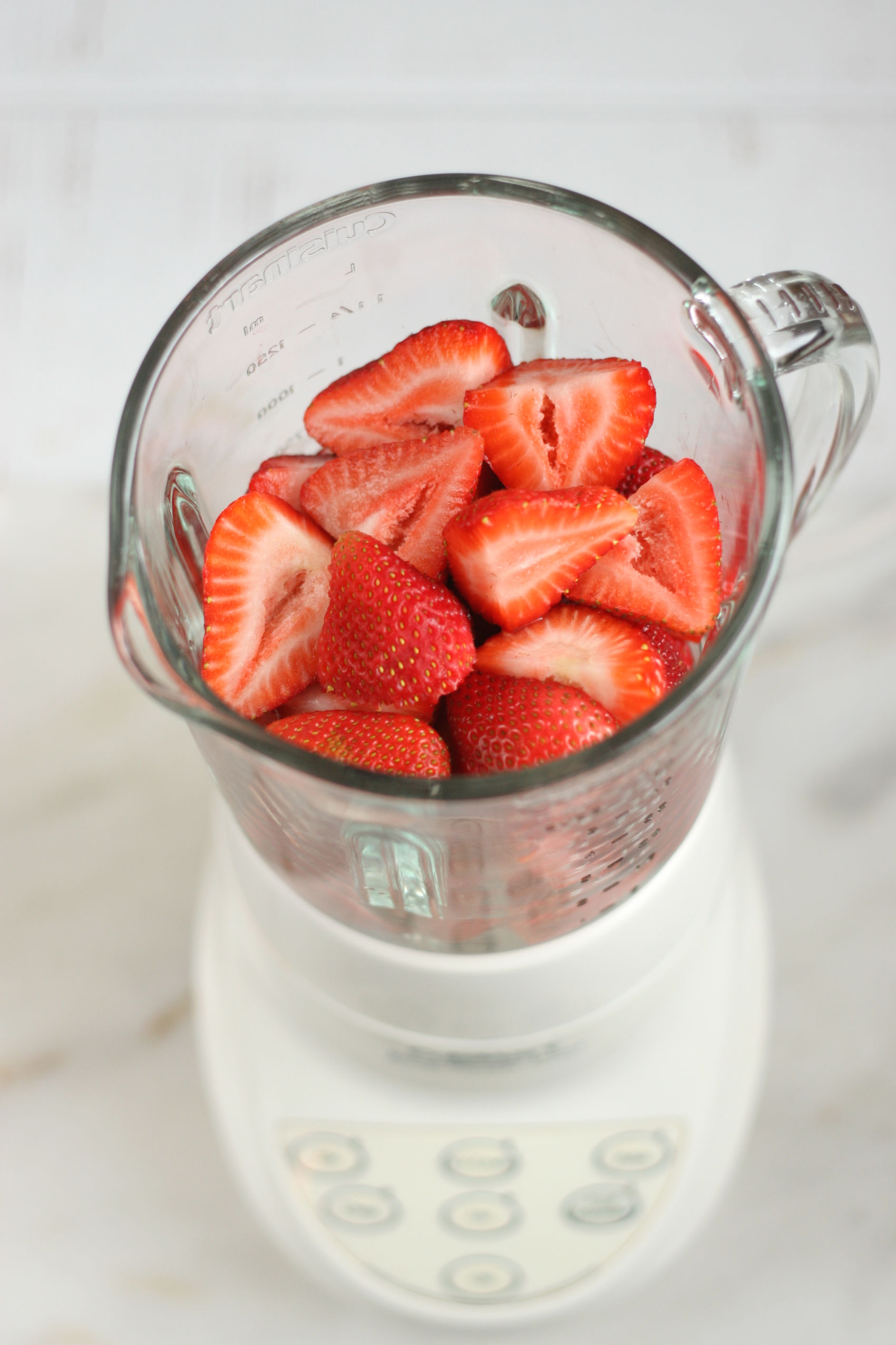 fresh strawberries in a blender.