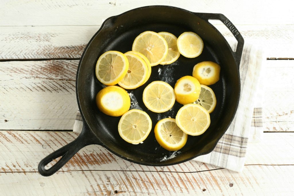 lemon slices in a cast iron skillet
