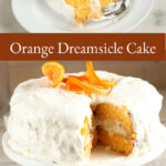 layered orange dreamsicle cake with frosting and slices of oranges on top