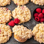 Close up of raspberry muffins in vintage muffin pan.