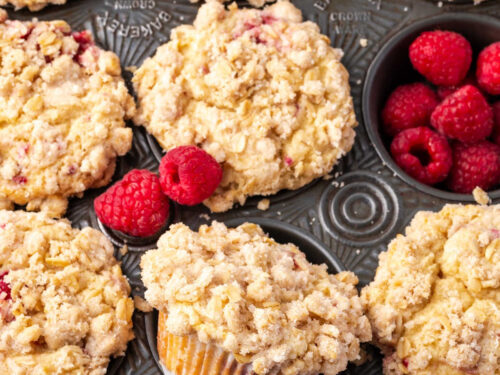 Close up of raspberry muffins in vintage muffin pan.