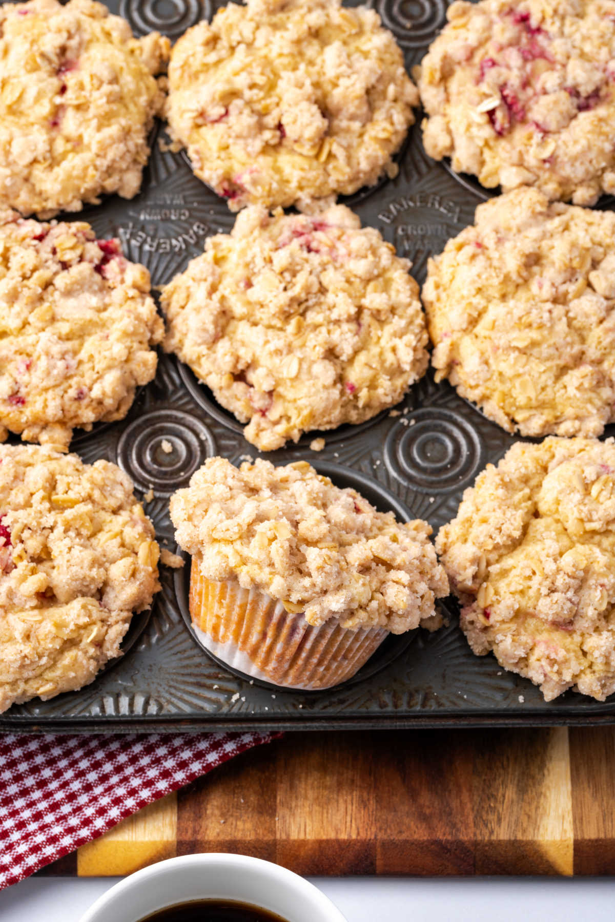 Raspberry crumb muffins in vintage muffin pan.