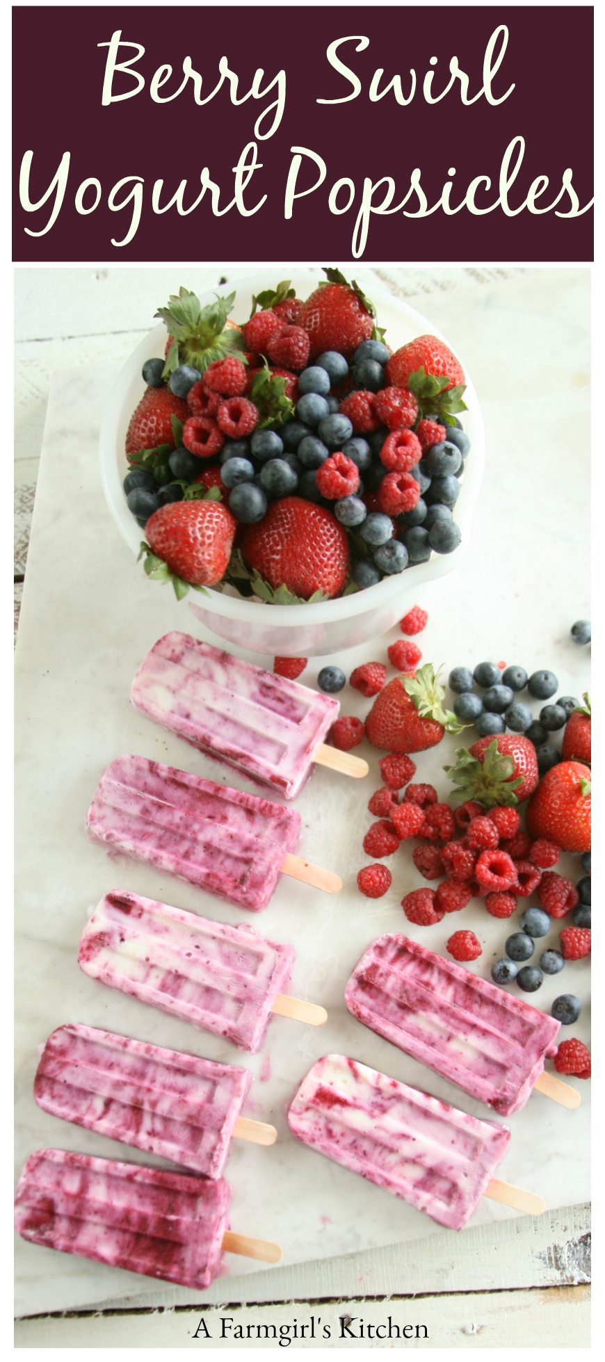 Berry Swirl Yogurt Popsicles are the perfect cold treat on a hot summer's day! #recipe #foodblogger #popsicles #berries #recipes #homemade