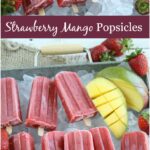 strawberry mango popsicles sitting in a tray of ice cubes