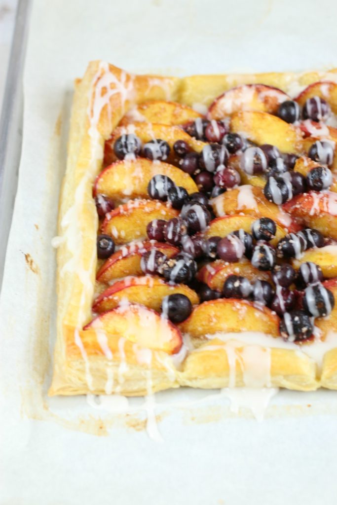 puff pastry tart with blueberries and peaches