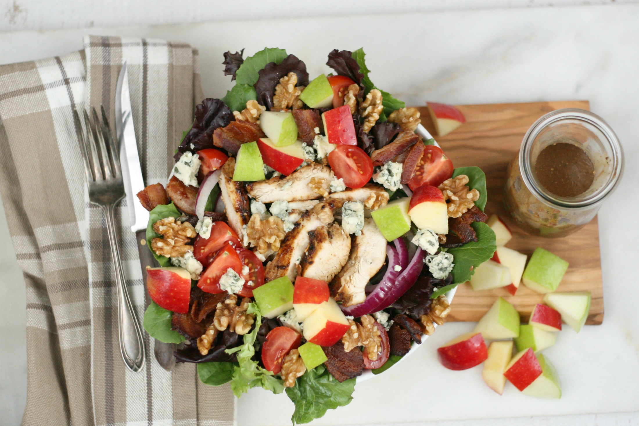 Harvest Chicken Salad with chopped apples, red onion, chunks of blue cheese and grilled chicken.