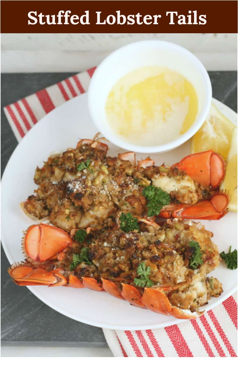 Stuffed Lobster Tails are a classic New England dish served at many restaurants. Lobster meat, combined with cracker crumbs and seasonings, stuffed back into the lobster tails and baked. #lobstertails #lobster #seafoodrecipes #recipe