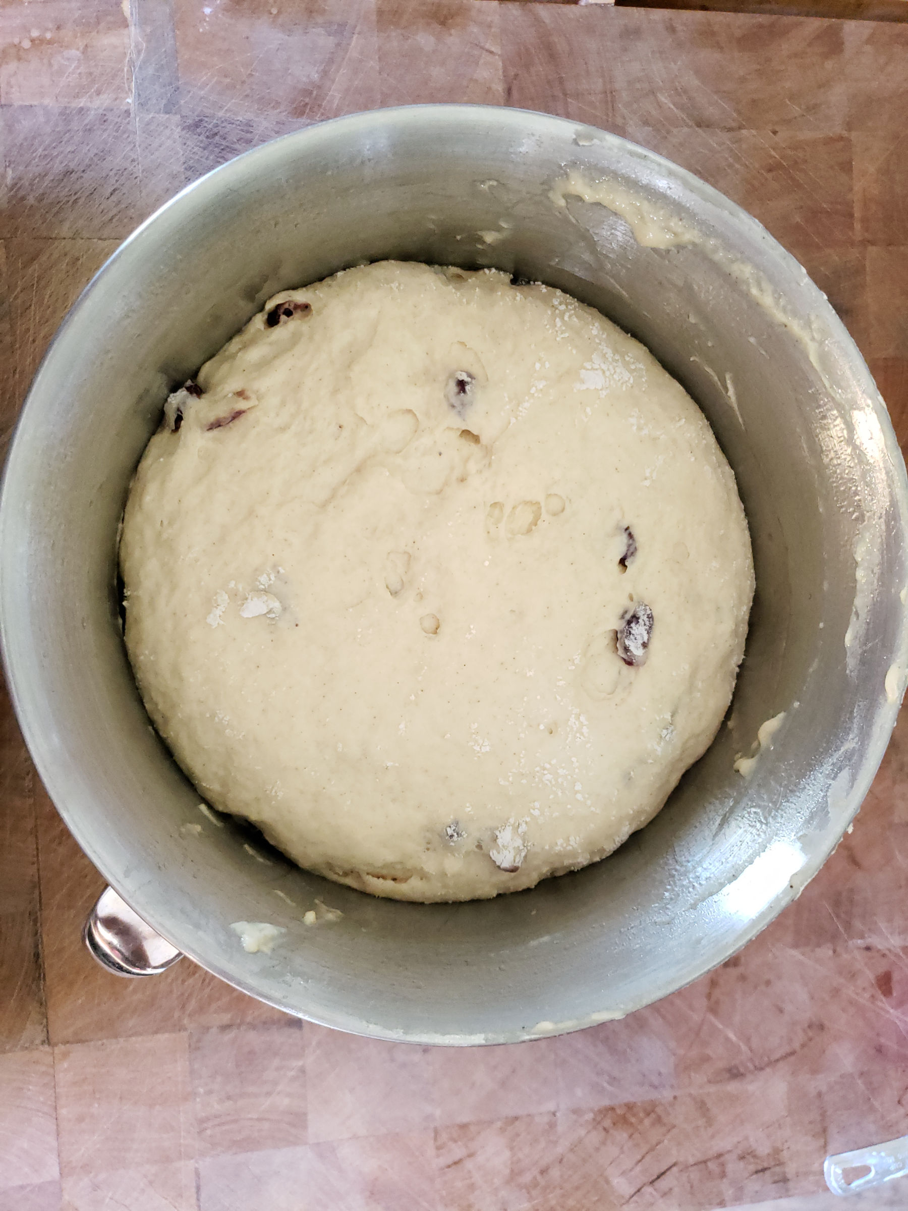 Cross buns dough risen and ready to shape into rounds.