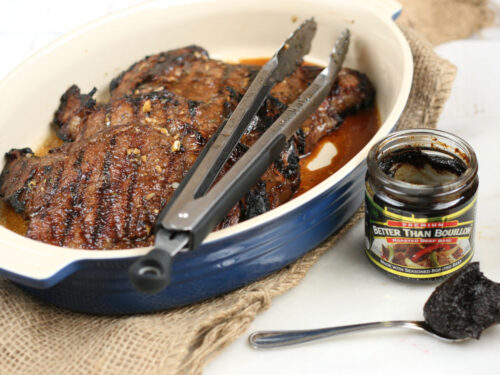 grilled steak in a ceramic dish