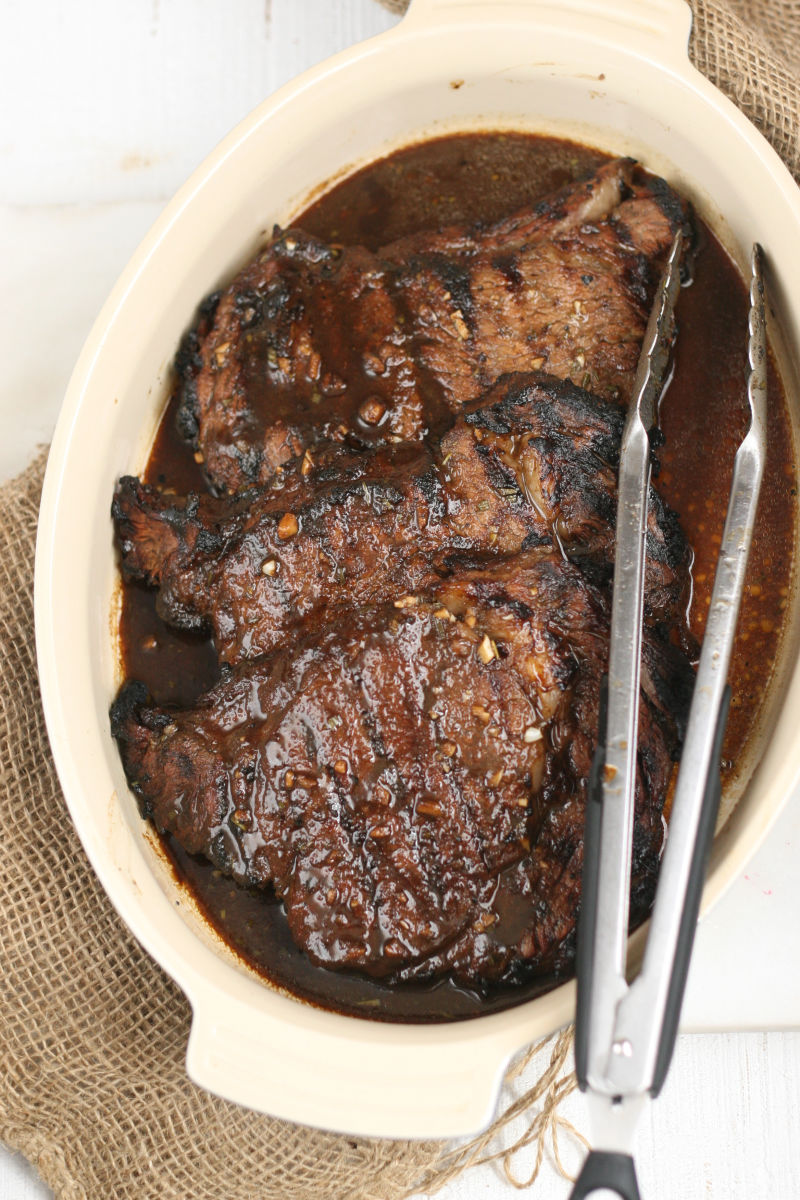 grilled steak in ceramic dish