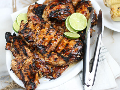 grilled chicken on a white serving plate