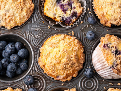 Blueberry muffins in vintage muffin baking pan.