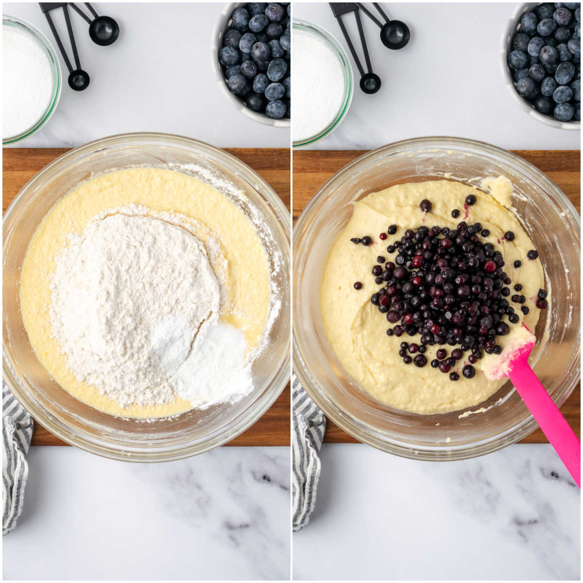 Mixing muffin batter in clear glass bowl, folding in wild blueberries with spatula.
