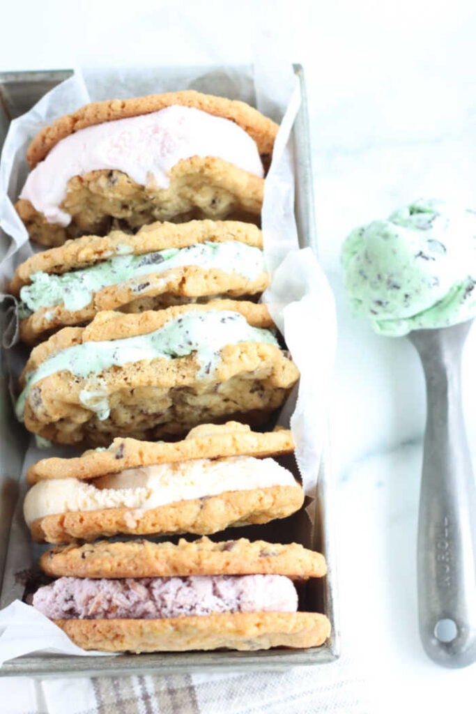 chocolate chip ice cream sandwiches lined up against each other in metal loaf pan