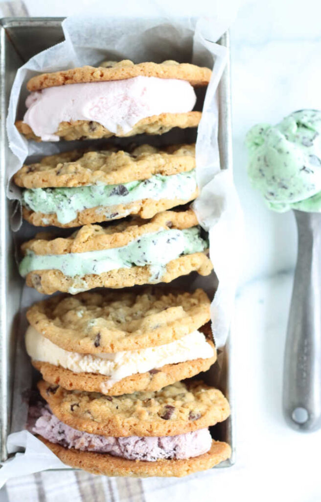 chocolate chip cookie ice cream sandwiches stacked against each other in rectangle loaf pan