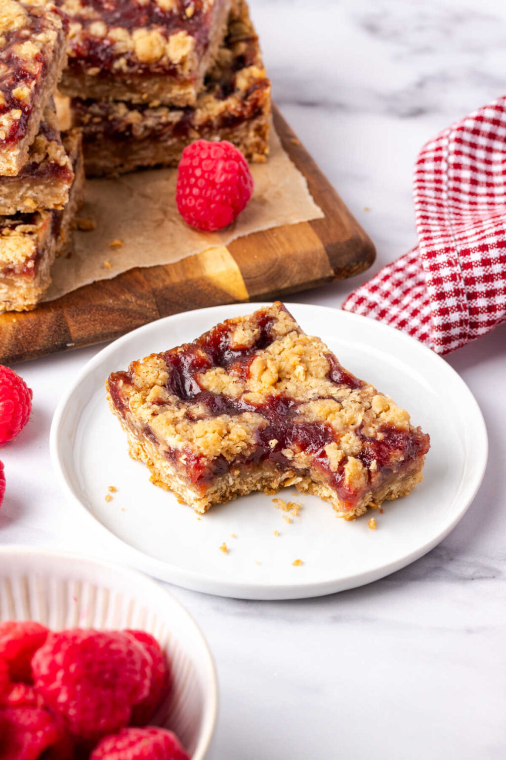 Raspberry Oatmeal Bars (Simple to make!) | A Farmgirl's Kitchen