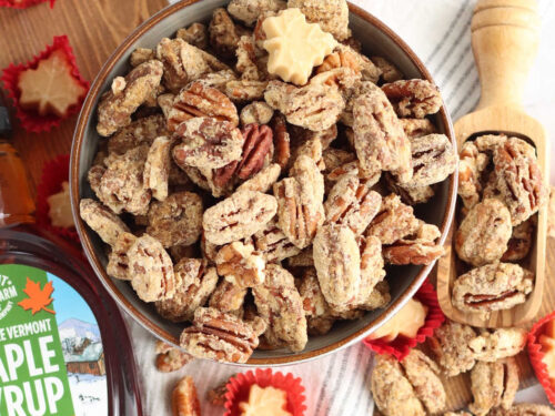Candied pecans in small bowl, maple candies around.