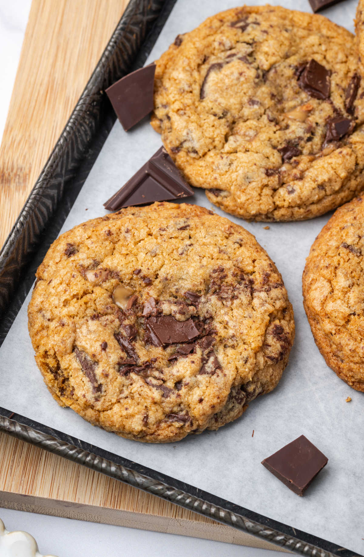 Chocolate chunk cookies on sheet pan.